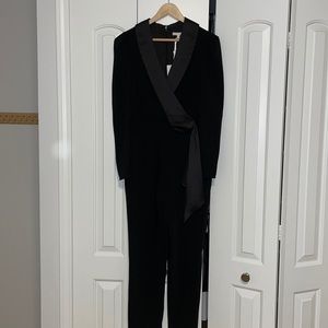 Anthropologie black jumpsuit with satin lapel